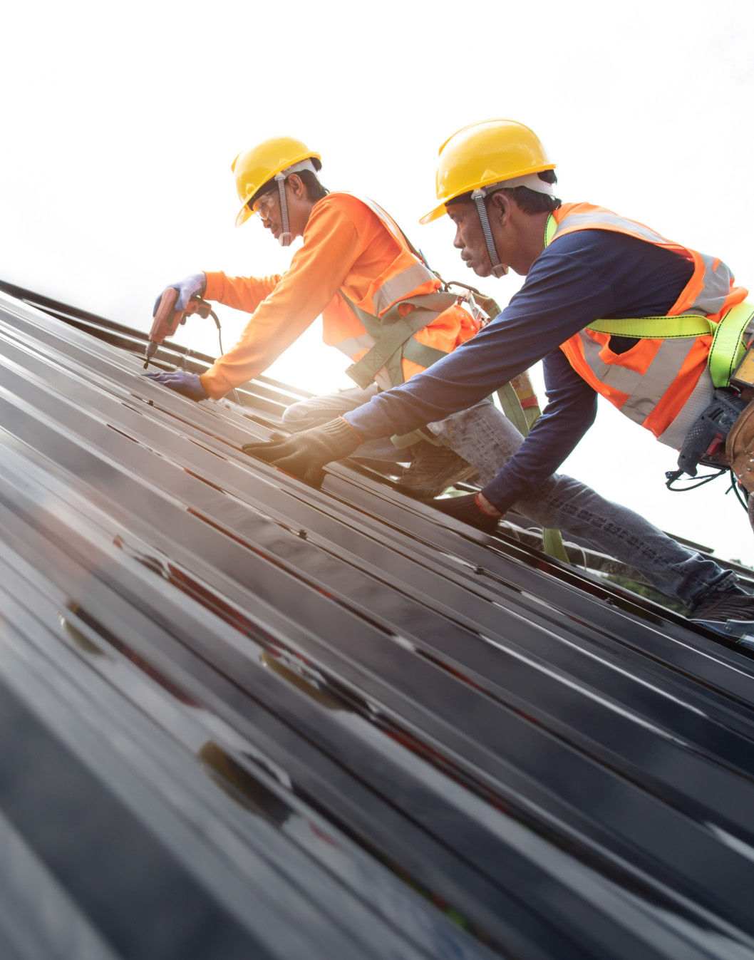 man working on a roof